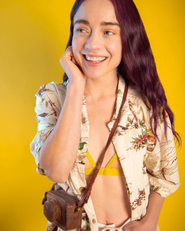 Hannah Kasulka is posing for a photo.